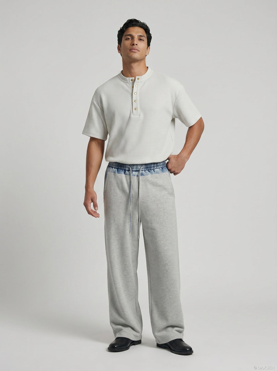 Detail of the short sleeve finish on the men's ribbed shirt