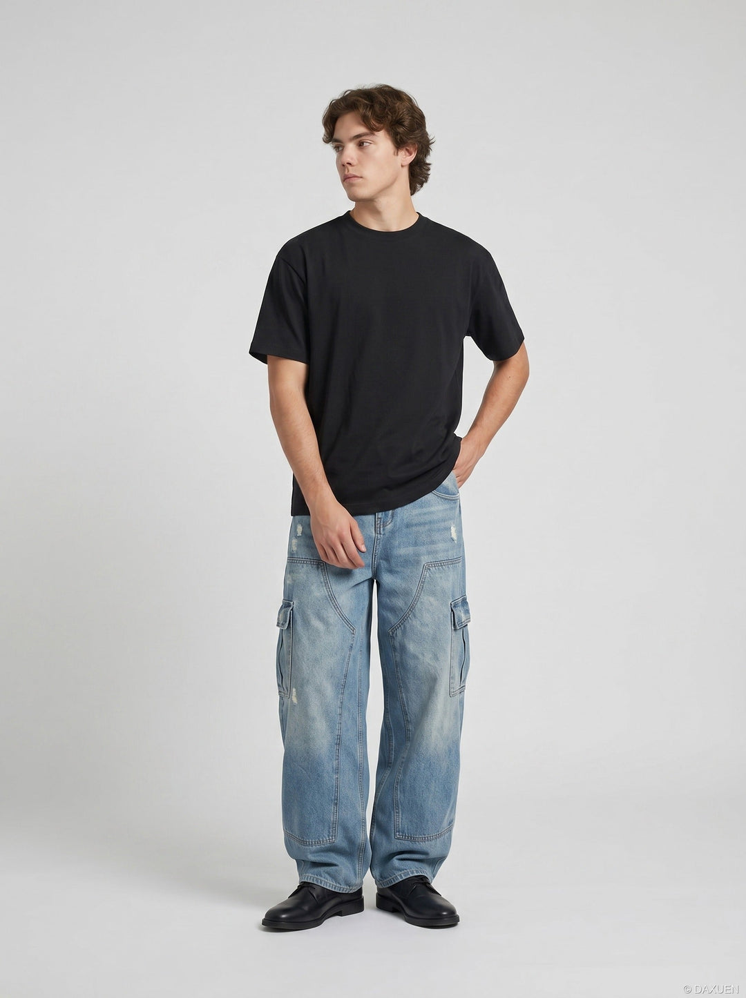 Full-length model wearing men's black regular fit T-shirt