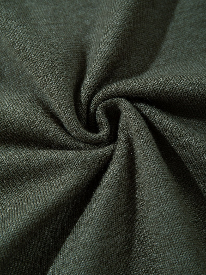 Men's olive green knit top shown from angled view