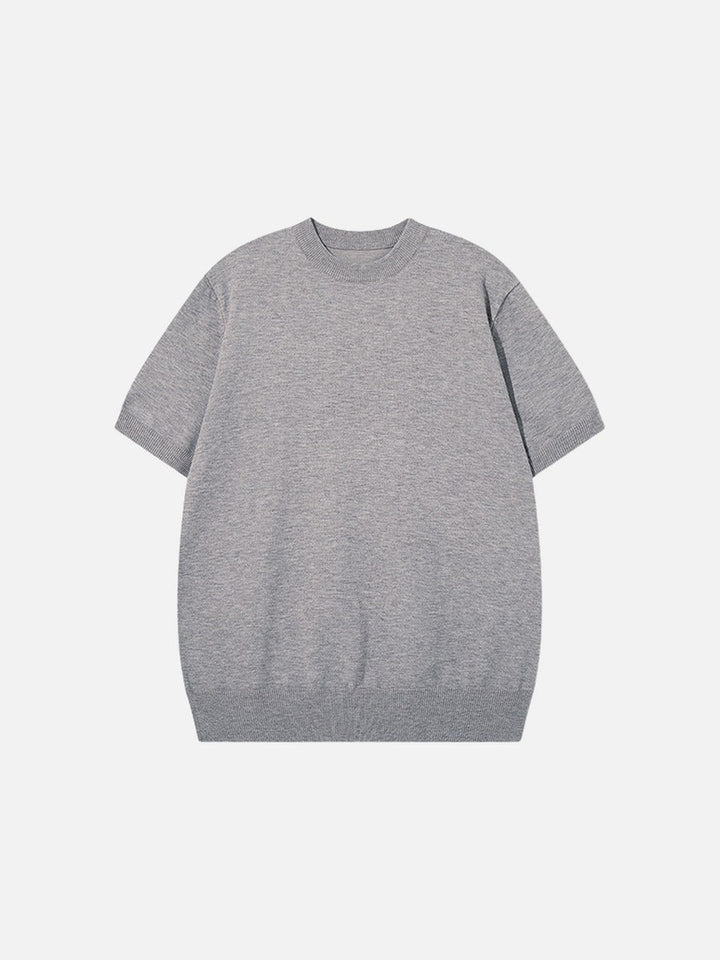 Men's olive green knit top styled for casual wear