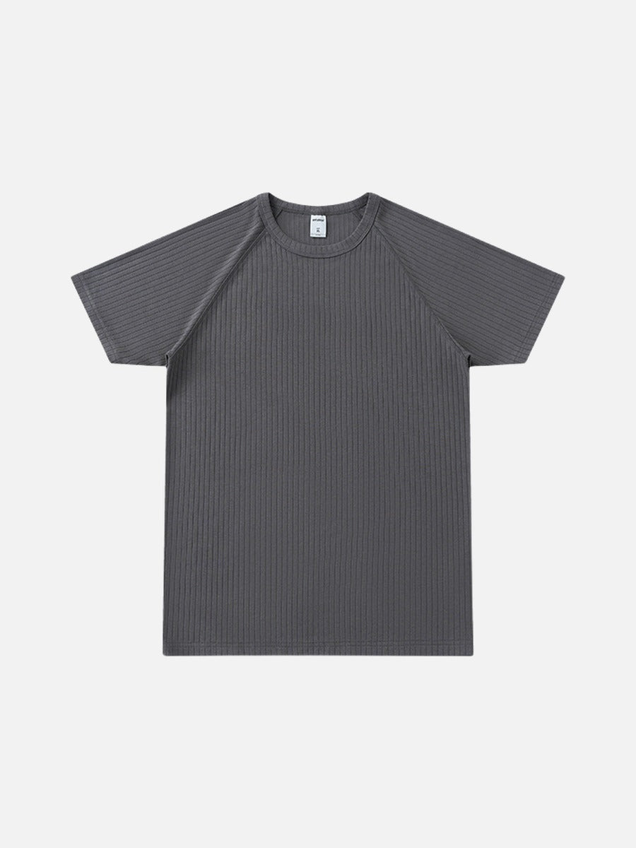 Close-up of the ribbed knit texture on the white men's T-shirt