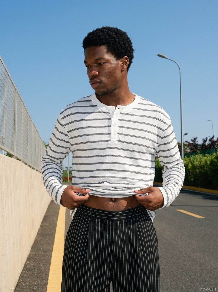 Men's white striped Henley shirt with long sleeves and relaxed silhouette