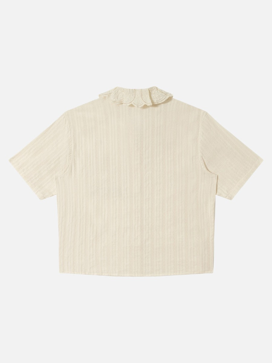 Men's cream textured short sleeve shirt shown from the back