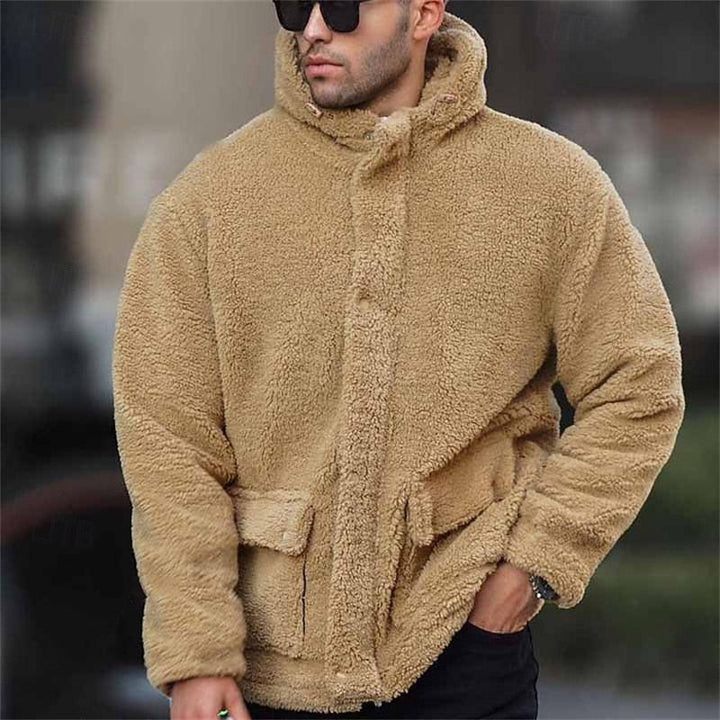 Close-up of the soft hood and front zip on a men's jacket