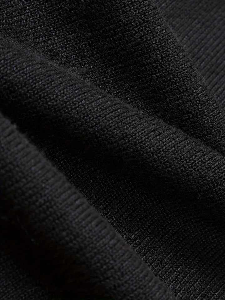Detail of the ribbed cuffs on a men's knitted jumper