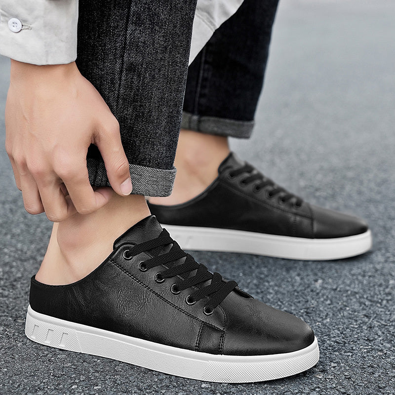 Close-up of the leather upper on men's mule trainers