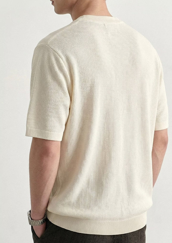 Men's textured polo shown from the back