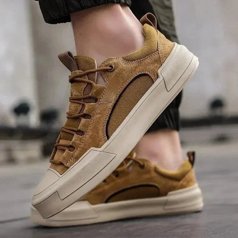 Men's canvas lace-up low-top sneakers shown in a side view