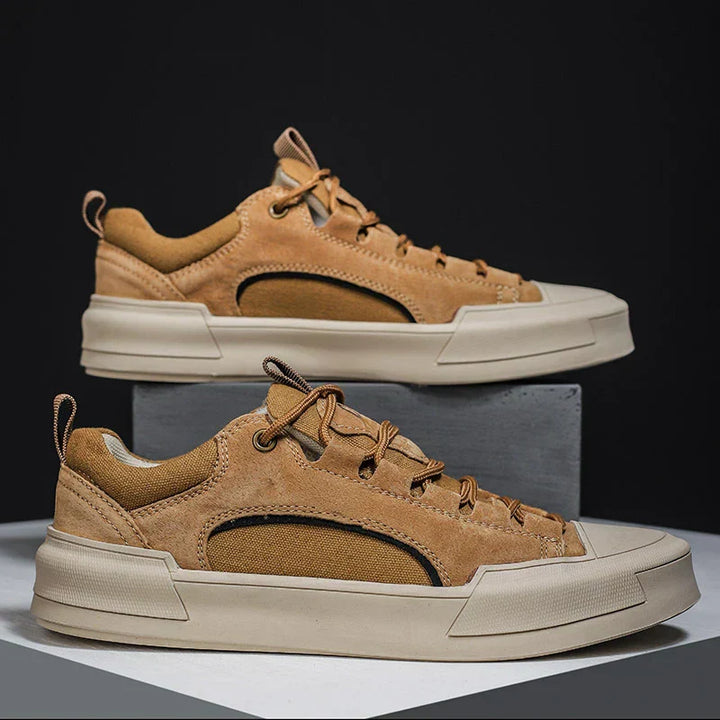 Low-top canvas trainers for men shown from the back