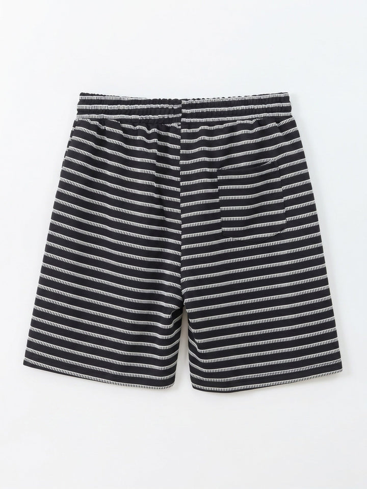 Men's stripe waffle knit shorts styled on a model from the side