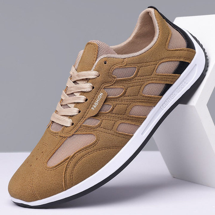 Men's suede sneakers shown from the side