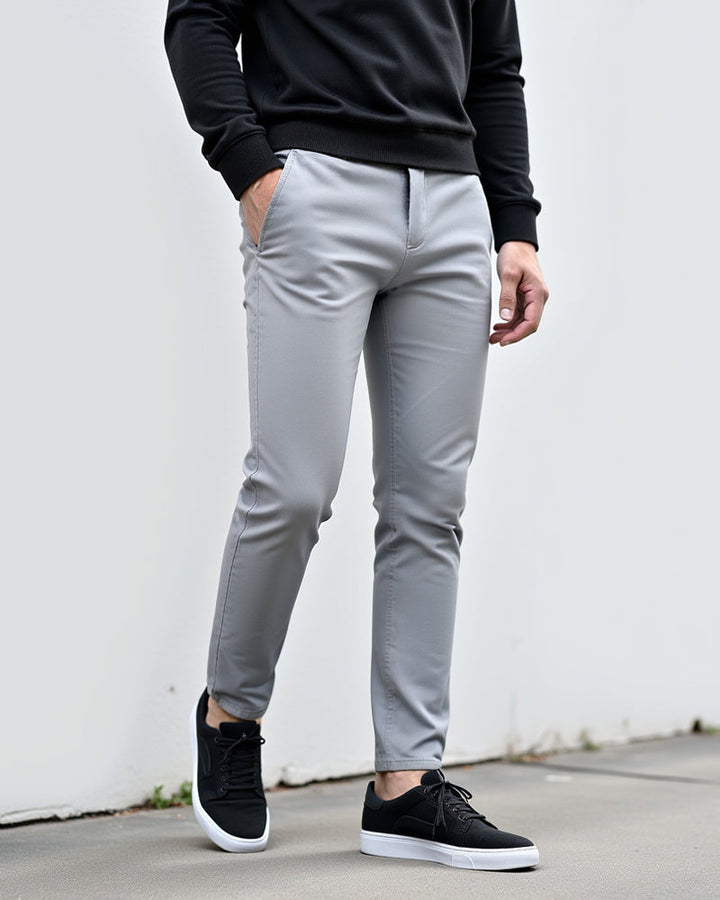 Men's slim fit tapered chinos shown from the back