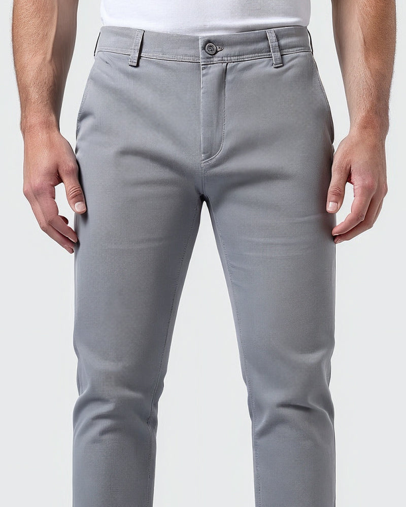 Close-up of tapered leg fit on men's slim chinos