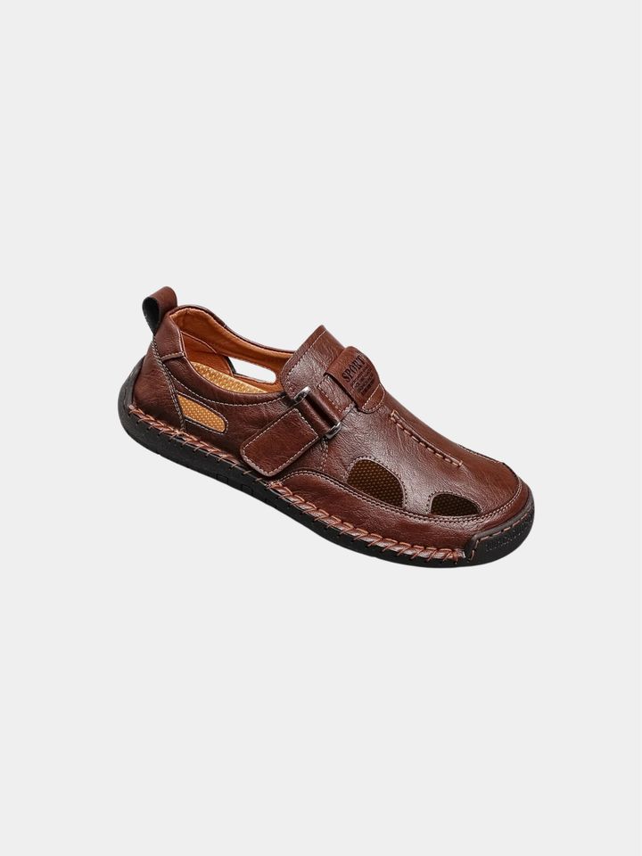 Men's clean line cushioned loafer shown from the side