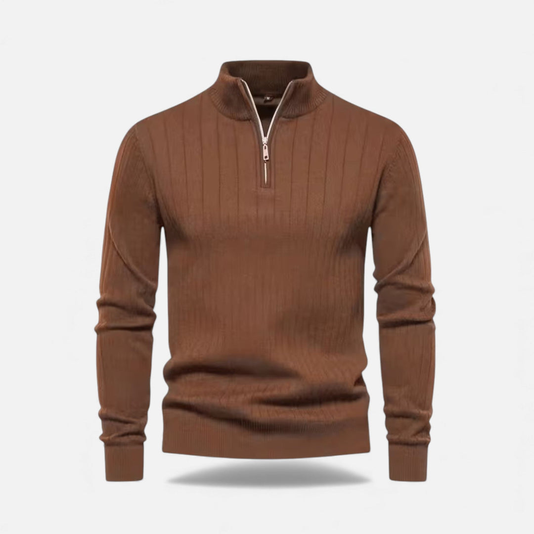 Detail of the cardigan's front zip and high neckline
