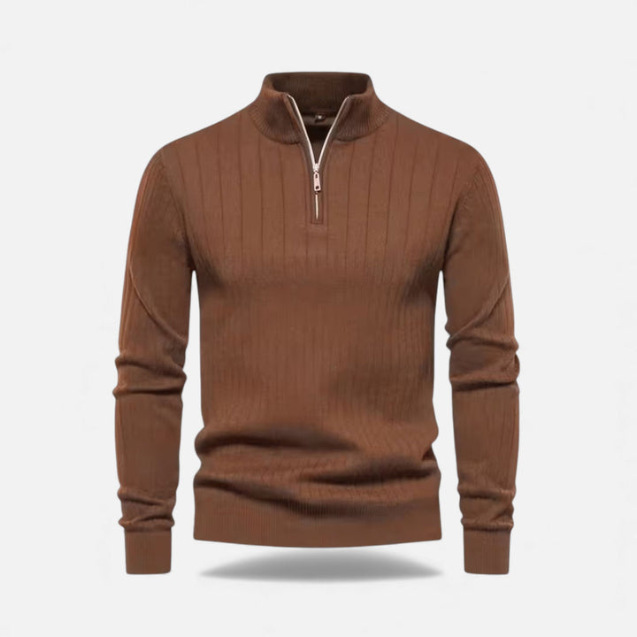 Detail of the cardigan's front zip and high neckline
