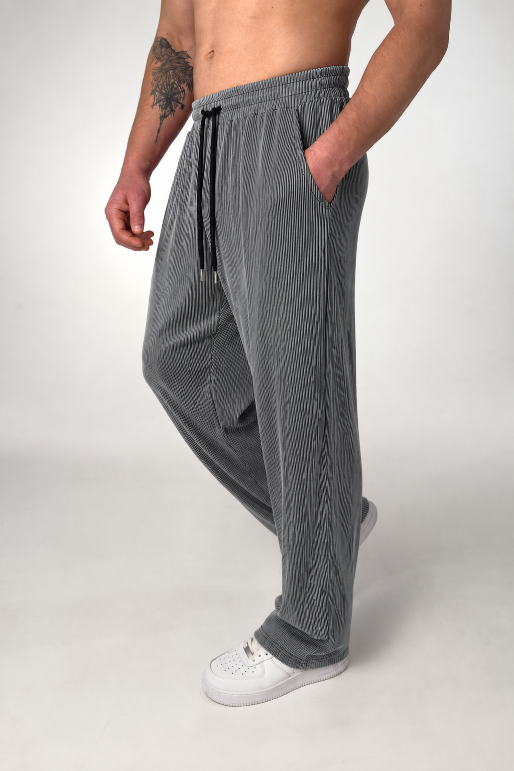 Men's straight-leg striped trousers shown from the front on a plain background