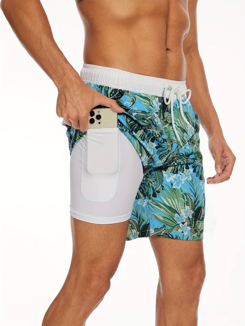 Men's flamingo print swim shorts styled for a beach holiday look