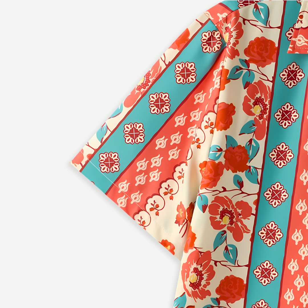 Close-up of floral print and camp collar on men's retro holiday shirt
