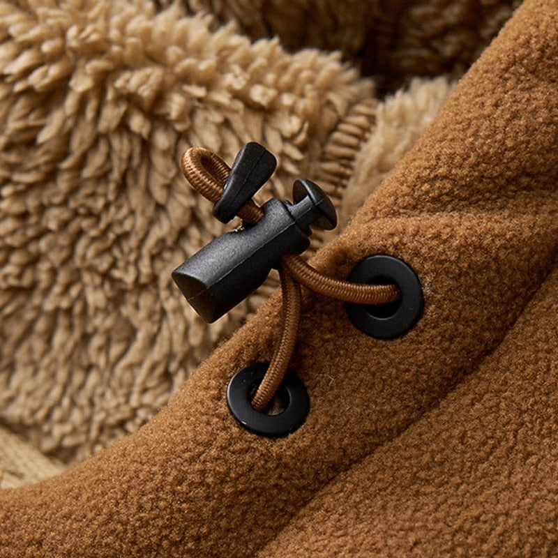 Detail of the jacket's zip fastening and hood
