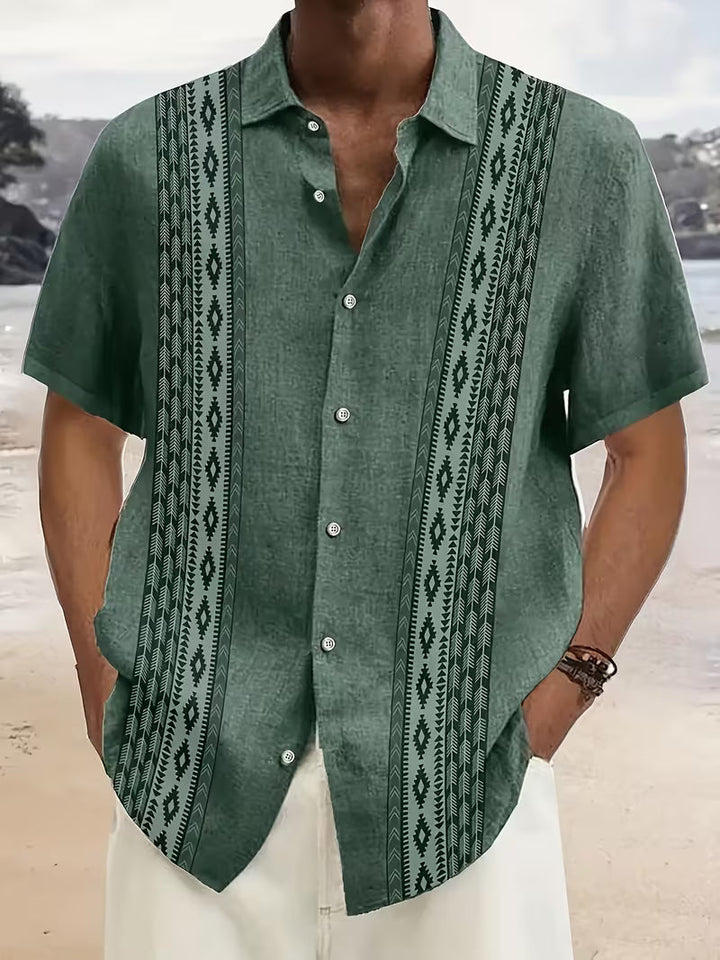 Front view of men's geometric print camp shirt in a relaxed holiday style