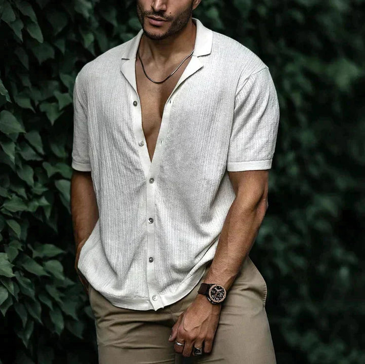 Men's short sleeve revere collar shirt with button fastening, angled front view