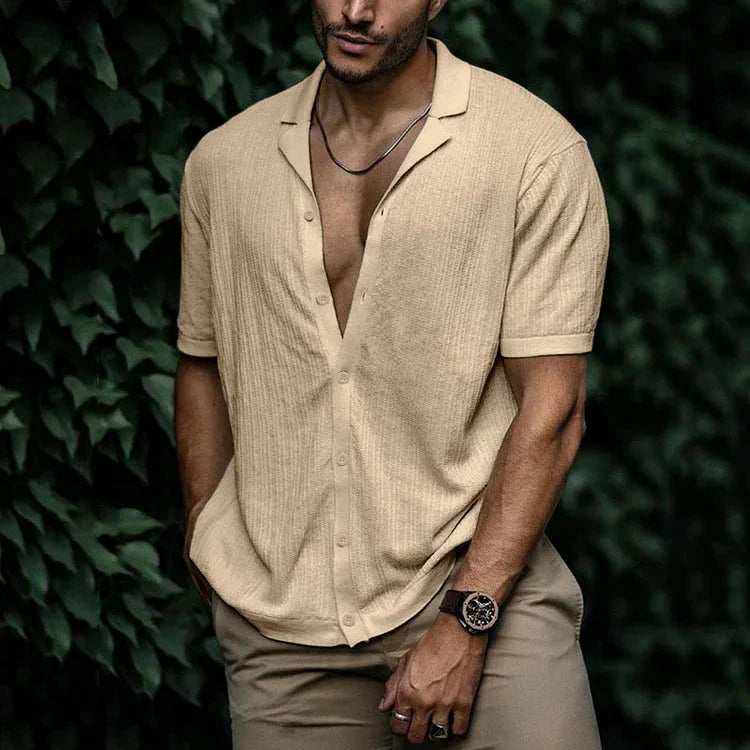 Detail of the button fastening on the relaxed fit men's shirt