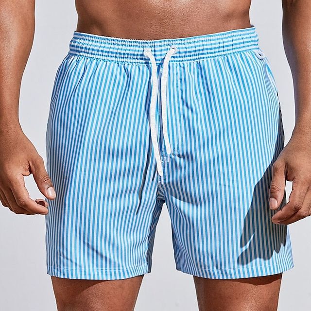 Rear view of men's striped swim shorts in a relaxed fit