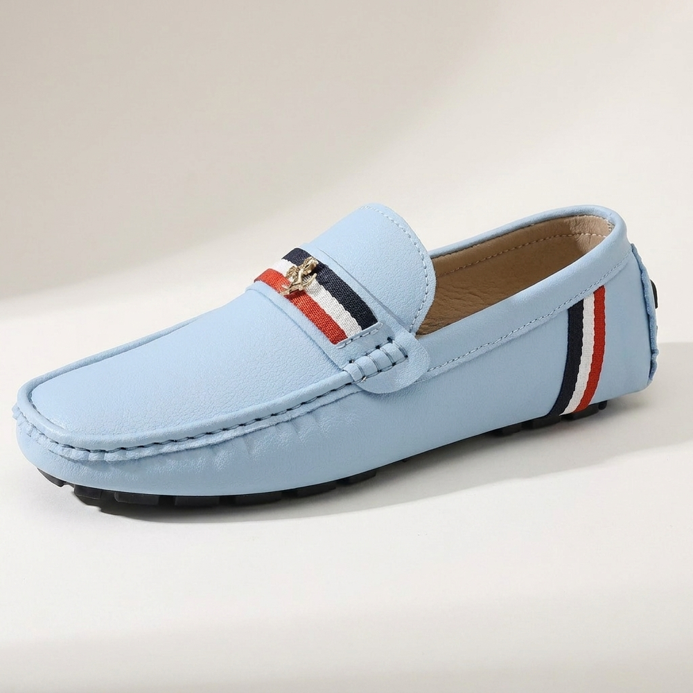 Pair of men's striped slip-on loafers from an angled front view