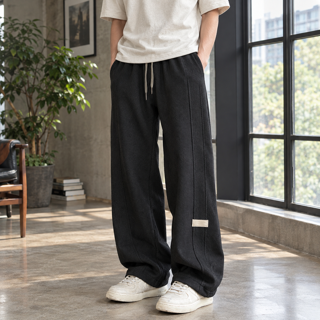 Men's textured wide leg trousers with a drawstring waist
