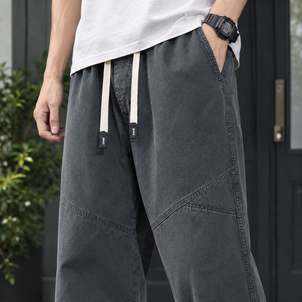 Men's relaxed straight leg cotton trousers displayed in full