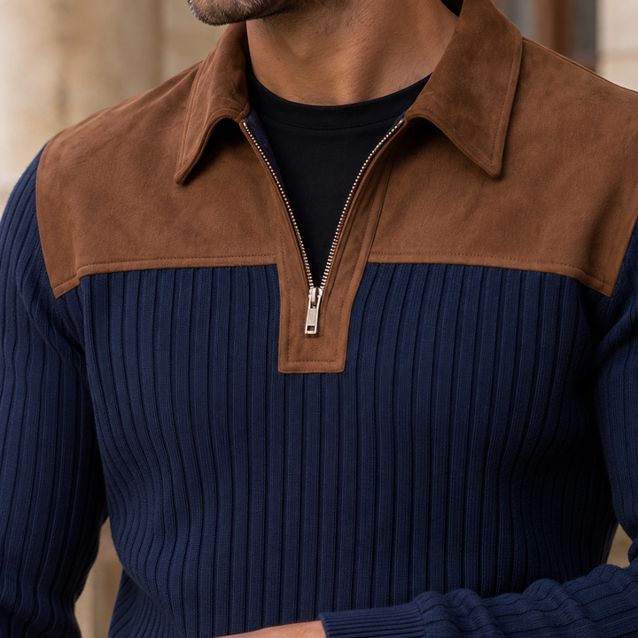 Close-up of the ribbed texture and quarter zip neckline on a men's sweater