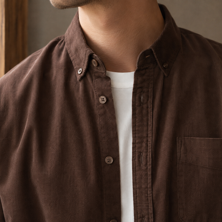 Men's relaxed-fit woven overshirt displayed from the back