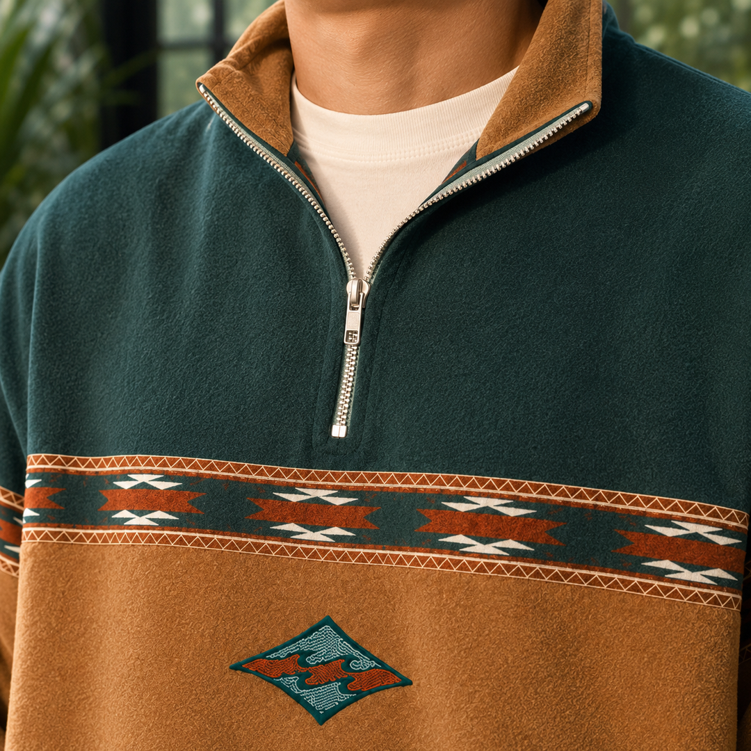 Front view of a men's quarter-zip sweater with geometric bands