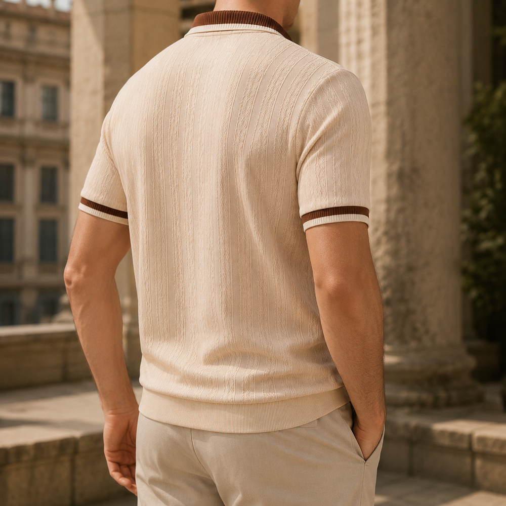 Close-up of the textured fabric on the men's half-zip polo