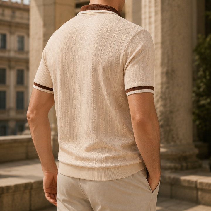 Close-up of the textured fabric on the men's half-zip polo