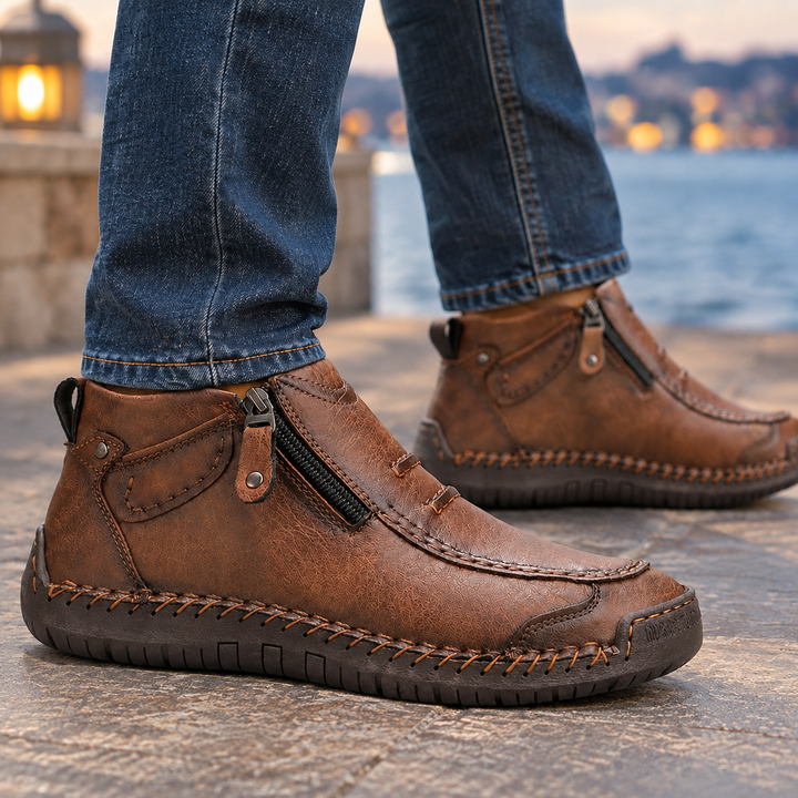 Close-up of the textured upper and moc toe stitching on men’s boots