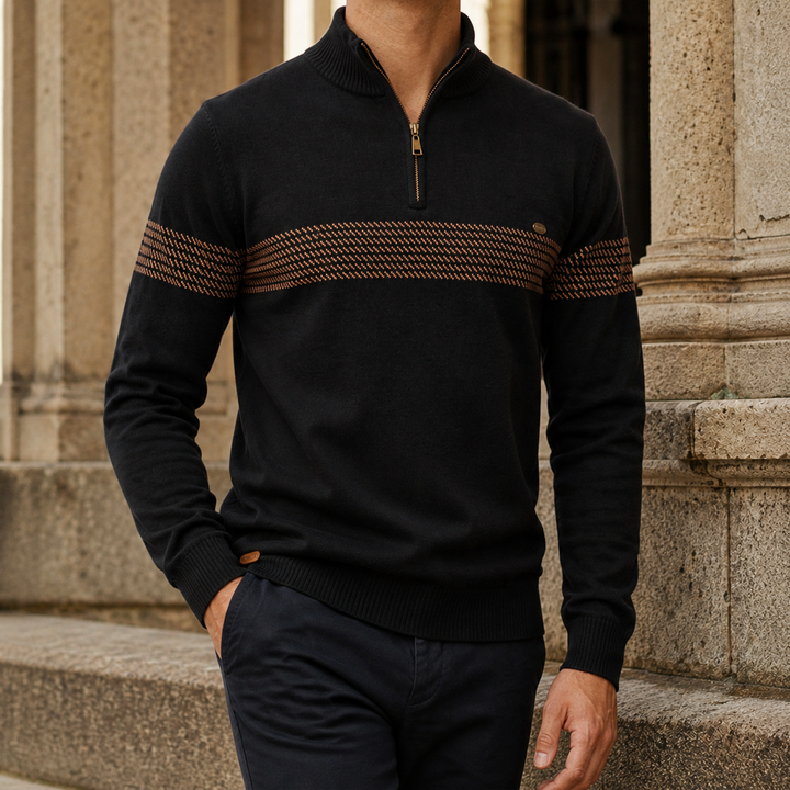 Close-up of the quarter zip fastening and chest stripe on a men's sweater