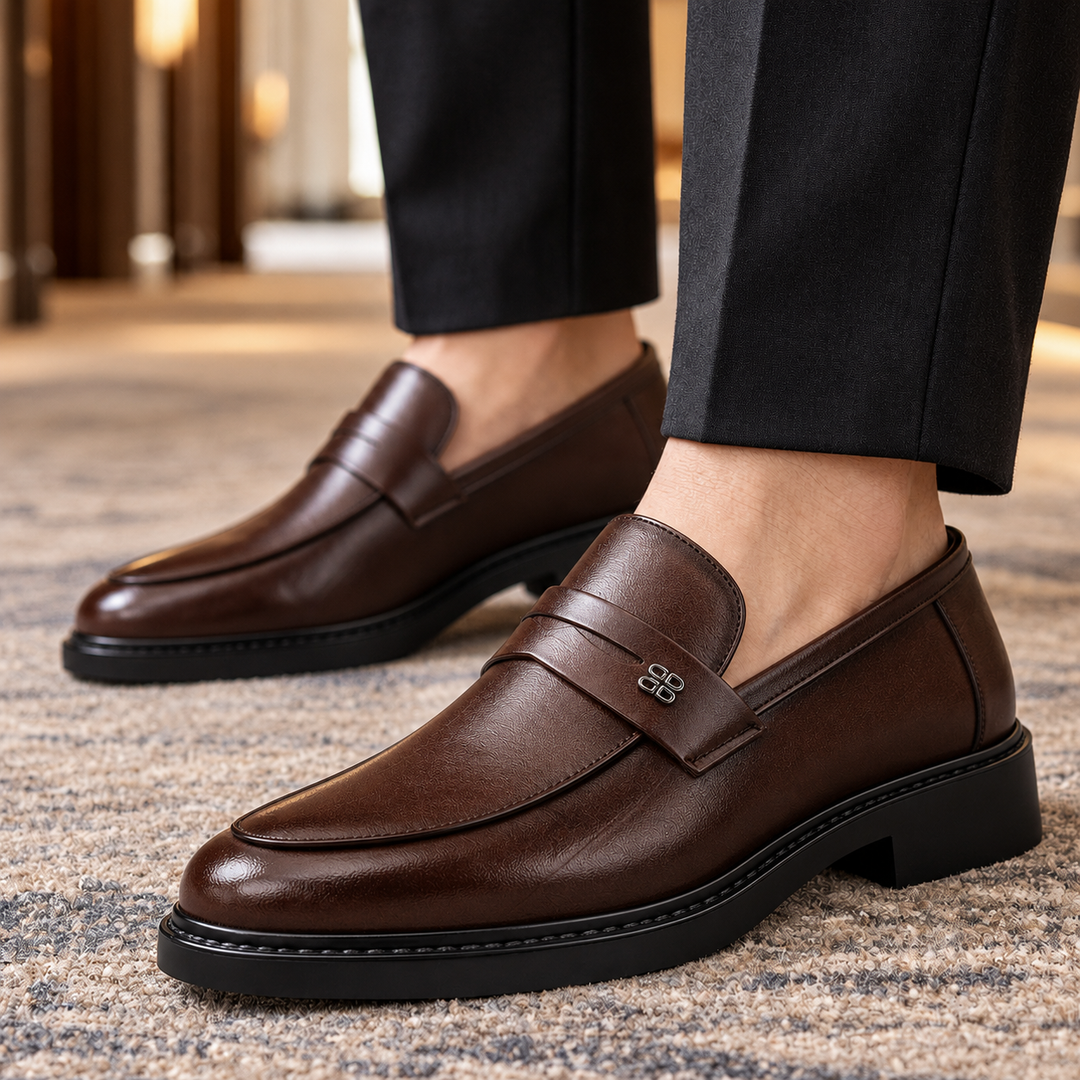 Men's leather slip-on loafers shown from above