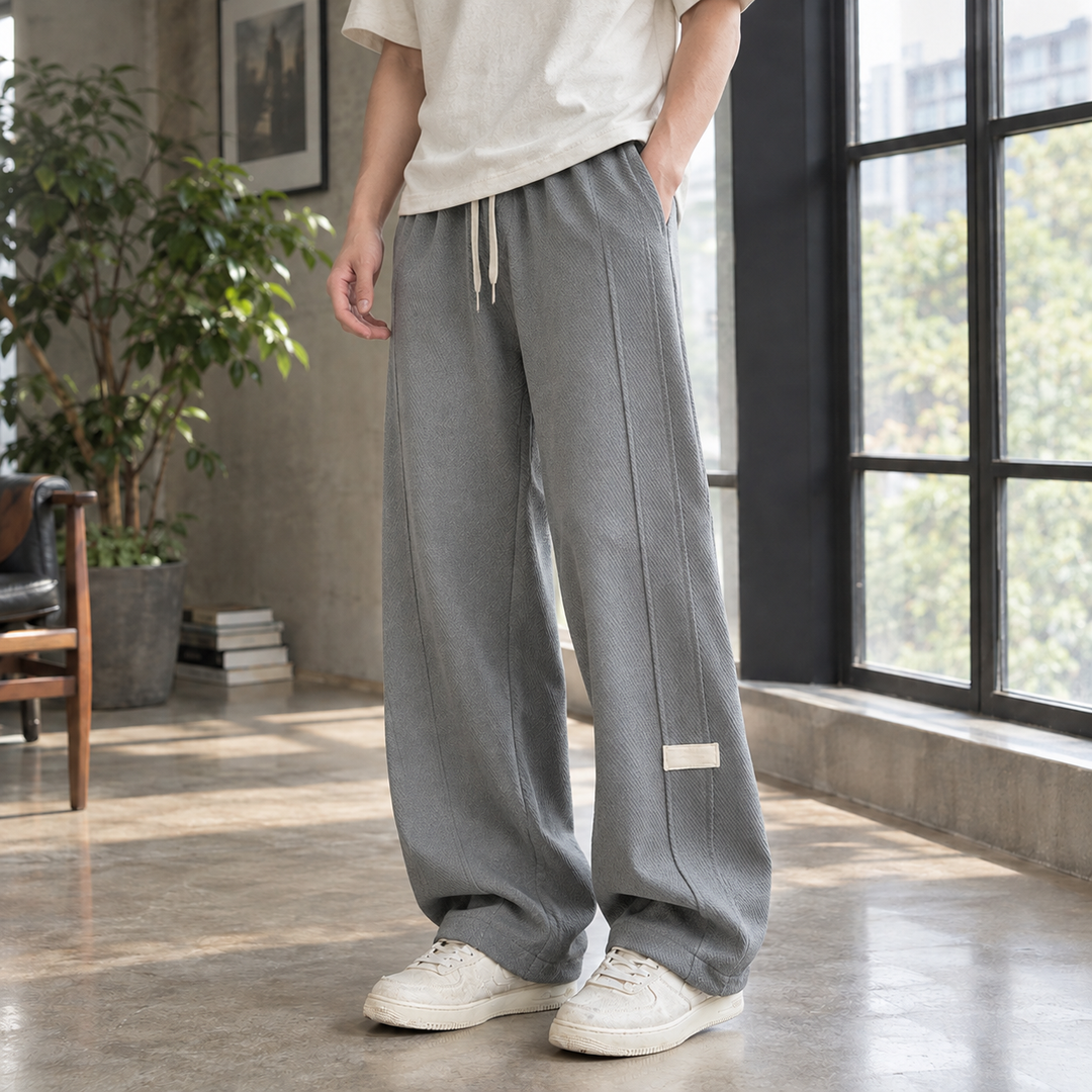 Men's trousers showing the relaxed wide leg silhouette