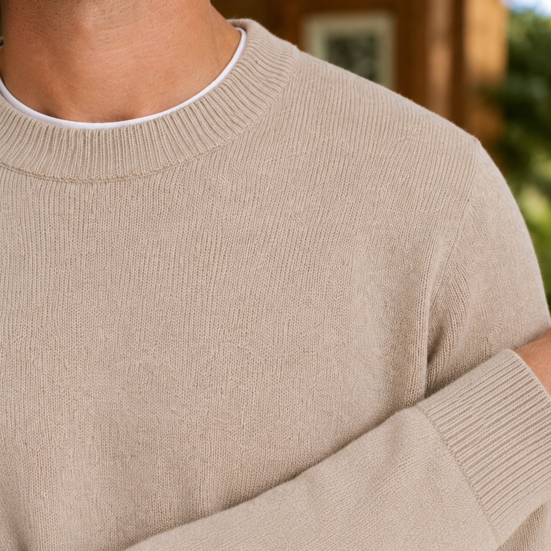 Close-up of the fine knit texture on a men's wool sweater