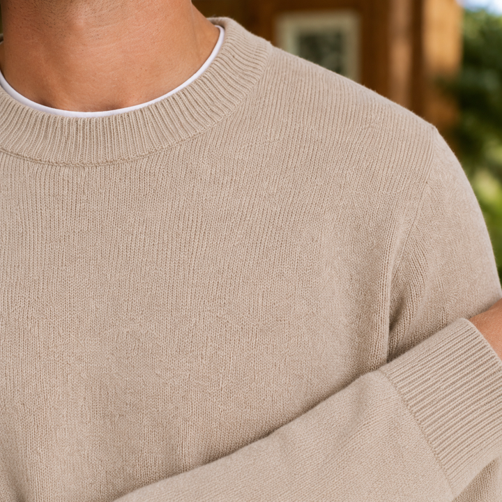 Close-up of the fine knit texture on a men's wool sweater