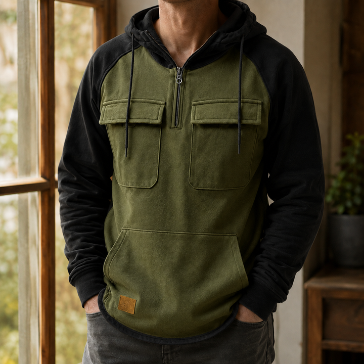 Close-up of the grey utility hood and half-zip fastening
