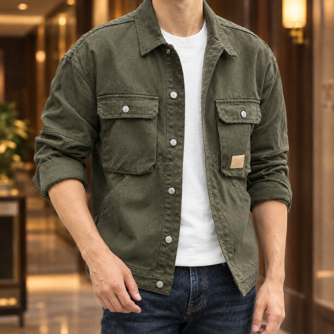 Men's relaxed-fit denim utility jacket displayed from the back