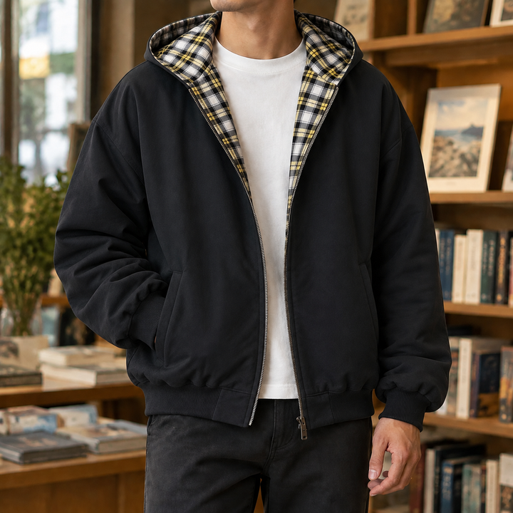 Reversible plaid jacket showing the hood and long sleeves