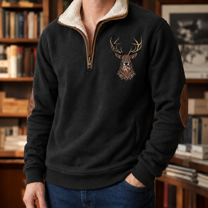 Deer motif detail on the front of the men’s quarter-zip knit jumper