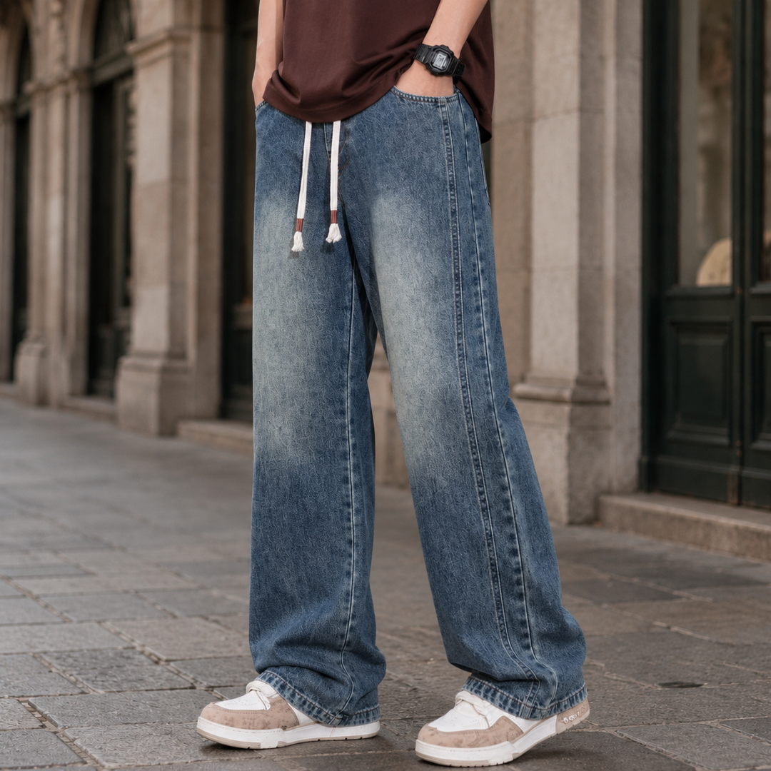 Side view of men's wide-leg cotton blend jeans with a relaxed fit
