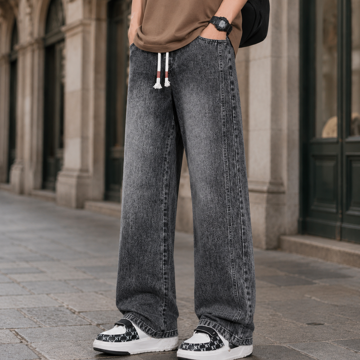 Close-up of the cotton blend denim fabric on men's relaxed jeans