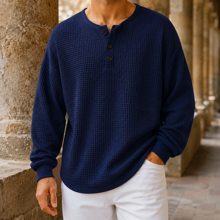 Men's waffle knit Henley sweater styled for a smart-casual outfit