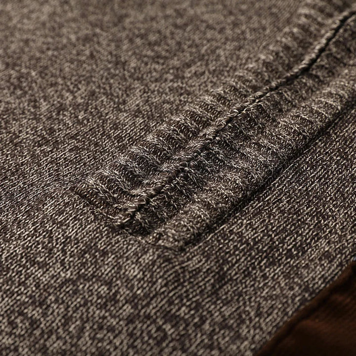 Men's cardigan displayed from the back to show its relaxed fit
